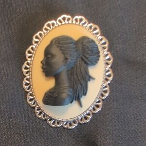 Elegant Black and Cream Cameo Brooch